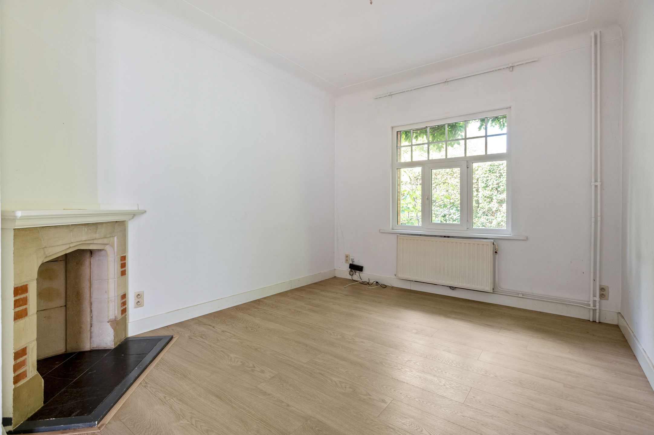Halfopen woning met 2 slaapkamers en een grote tuin in Brasschaat te huur! foto 4