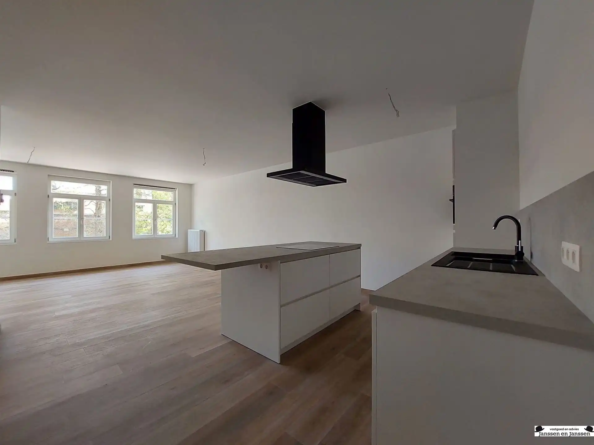 Stijlvol afgewerkt appartement met 2 slpks, twee auto-staanplaatsen en terras in het centrum van Gooreind (ca.100m²) foto 7