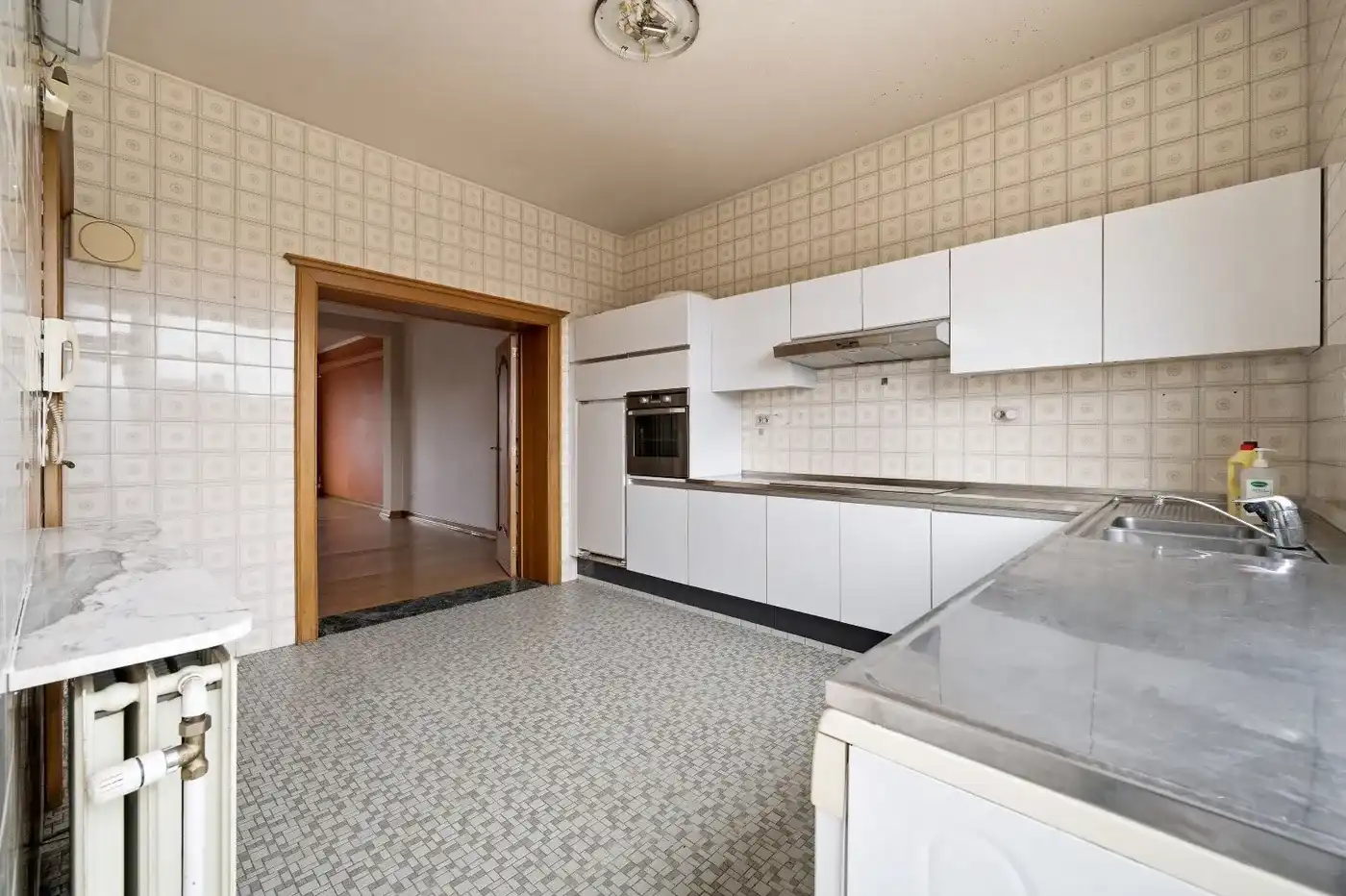 Te renoveren bel-étagewoning op topligging in het centrum van Tienen foto 12