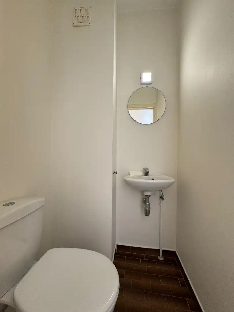 een 2-SLPK- hoekappartement met garage en berging foto 10