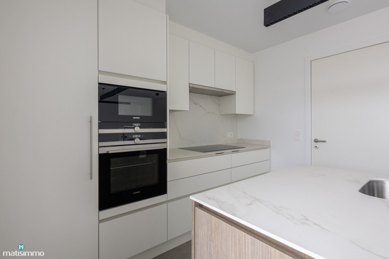NIEUWBOUWDUPLEXAPPARTEMENT VOORZIEN VAN ALLE COMFORT MET DRIE SLAAPKAMERS TE MOPERTINGEN foto 8