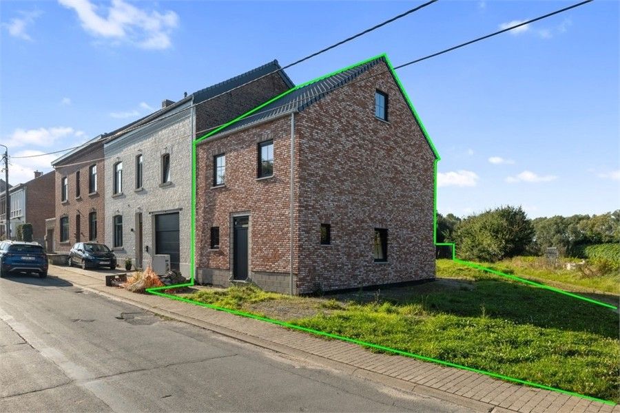 NIEUWBOUWWONING HALFOPEN BEBOUWING IN PASTORIJSTIJL IN WAASMONT foto {{pictureIndex}}