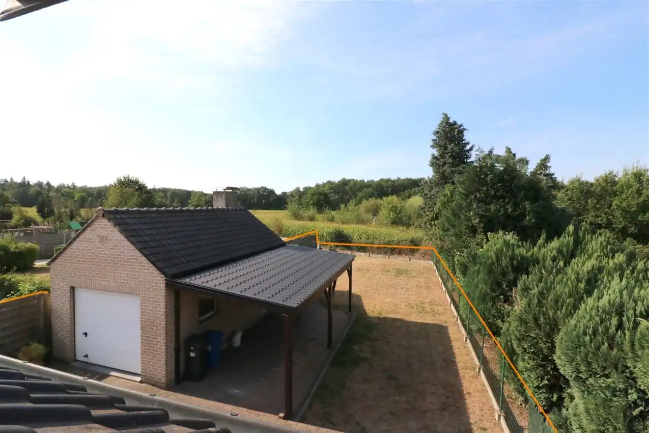 Gusting gelegen woning met 3 slp, garage en tuin foto 25