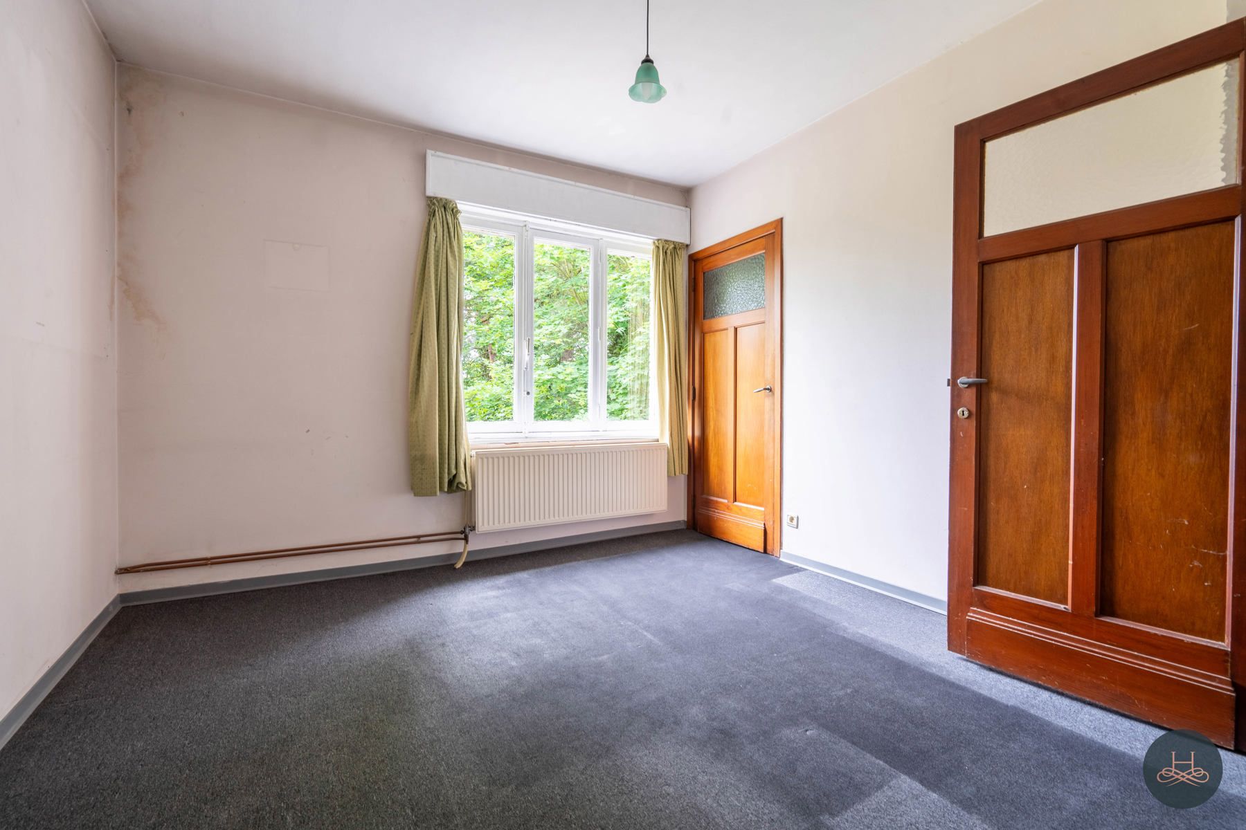 Achterliggende gezinswoning op rustgevend perceel foto 13