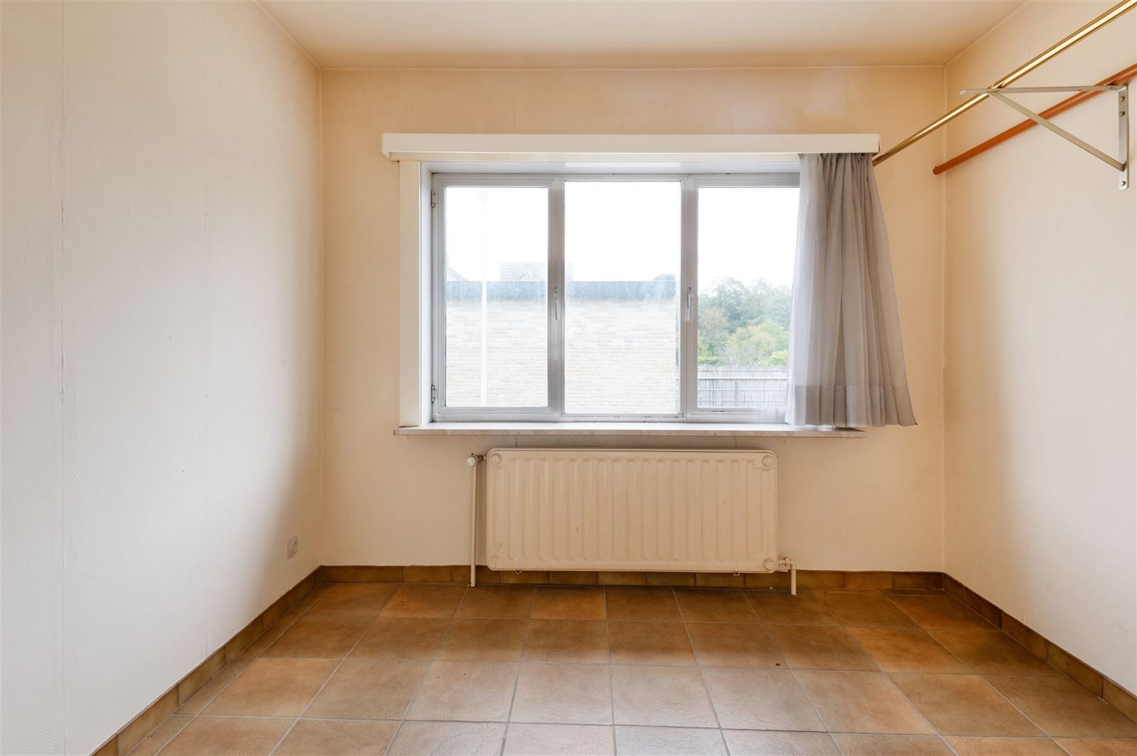 Handelswoning met appartement, garage en parkeerplaats foto 12