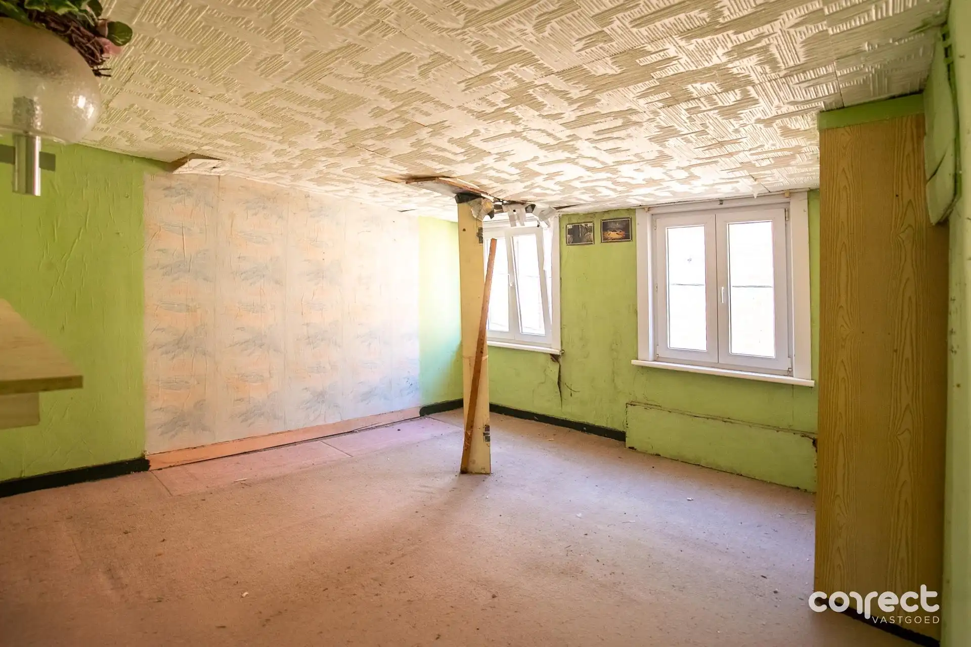 Volledig te renoveren woning met diepe tuin op rustige ligging. foto 5