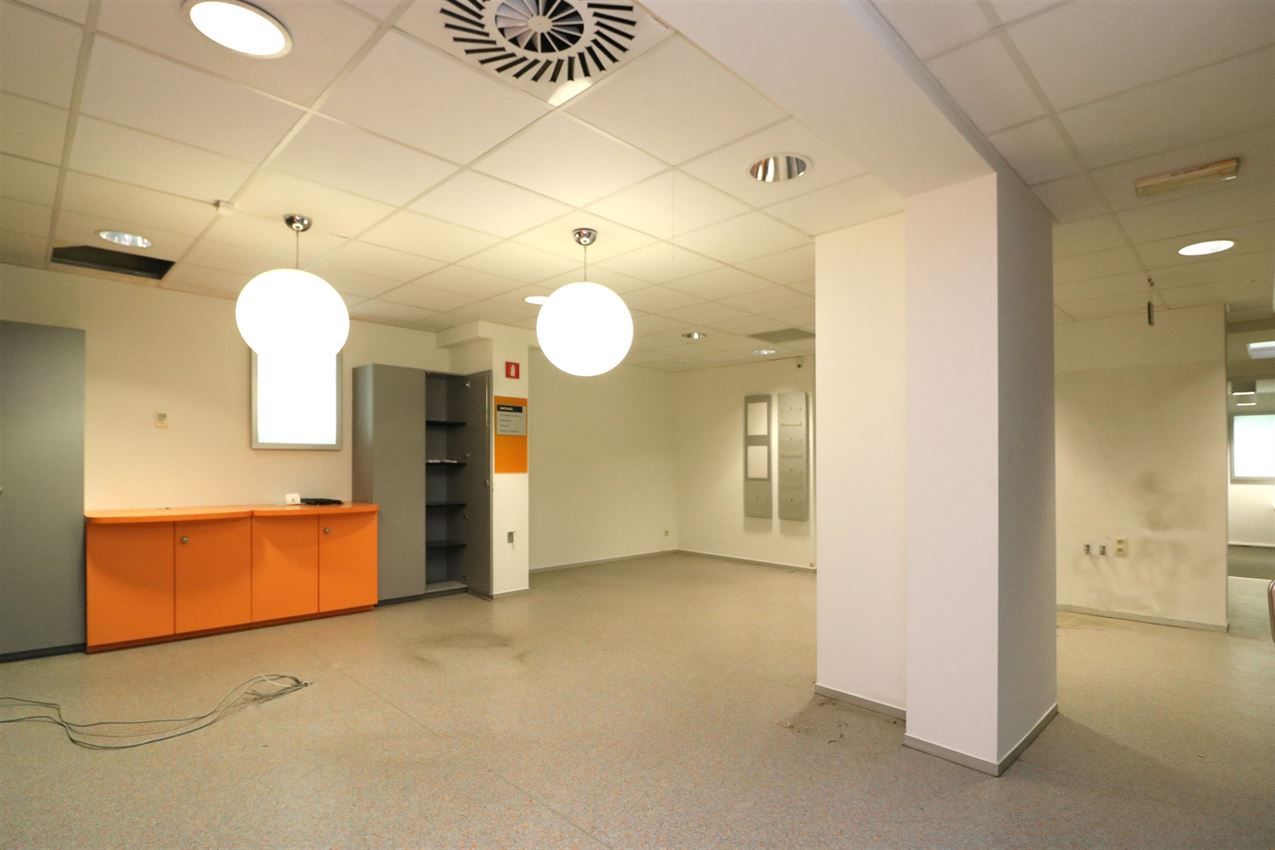 Opbrengsteigendom (handel & 4 app) op toplocatie foto 6