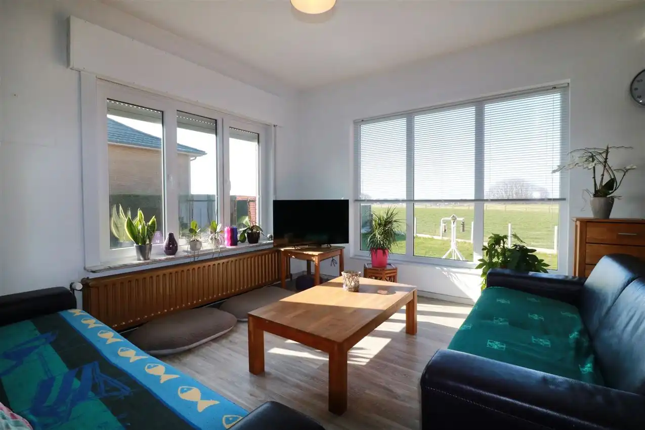 Gusting gelegen woning met 2 slpk, garage en tuin foto 5