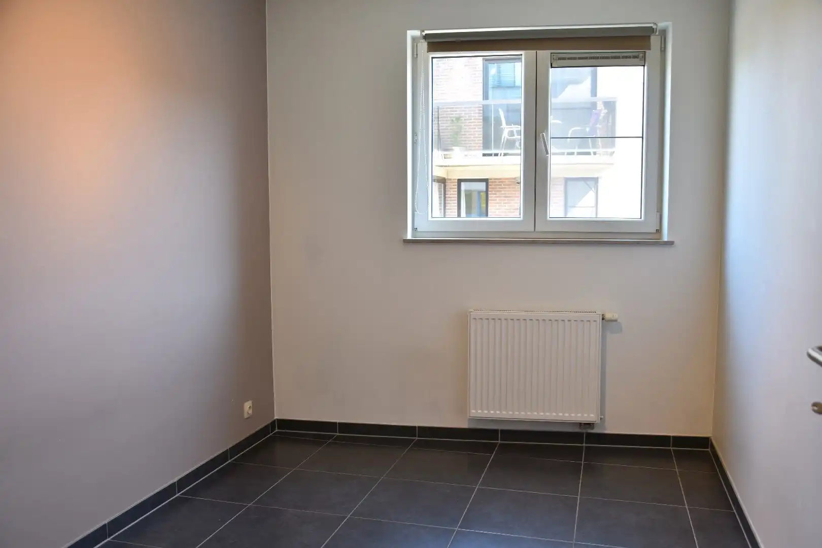 Instapklaar 2-slaapkamer appartement met zonnig terras in het hartje van Gullegem foto 7
