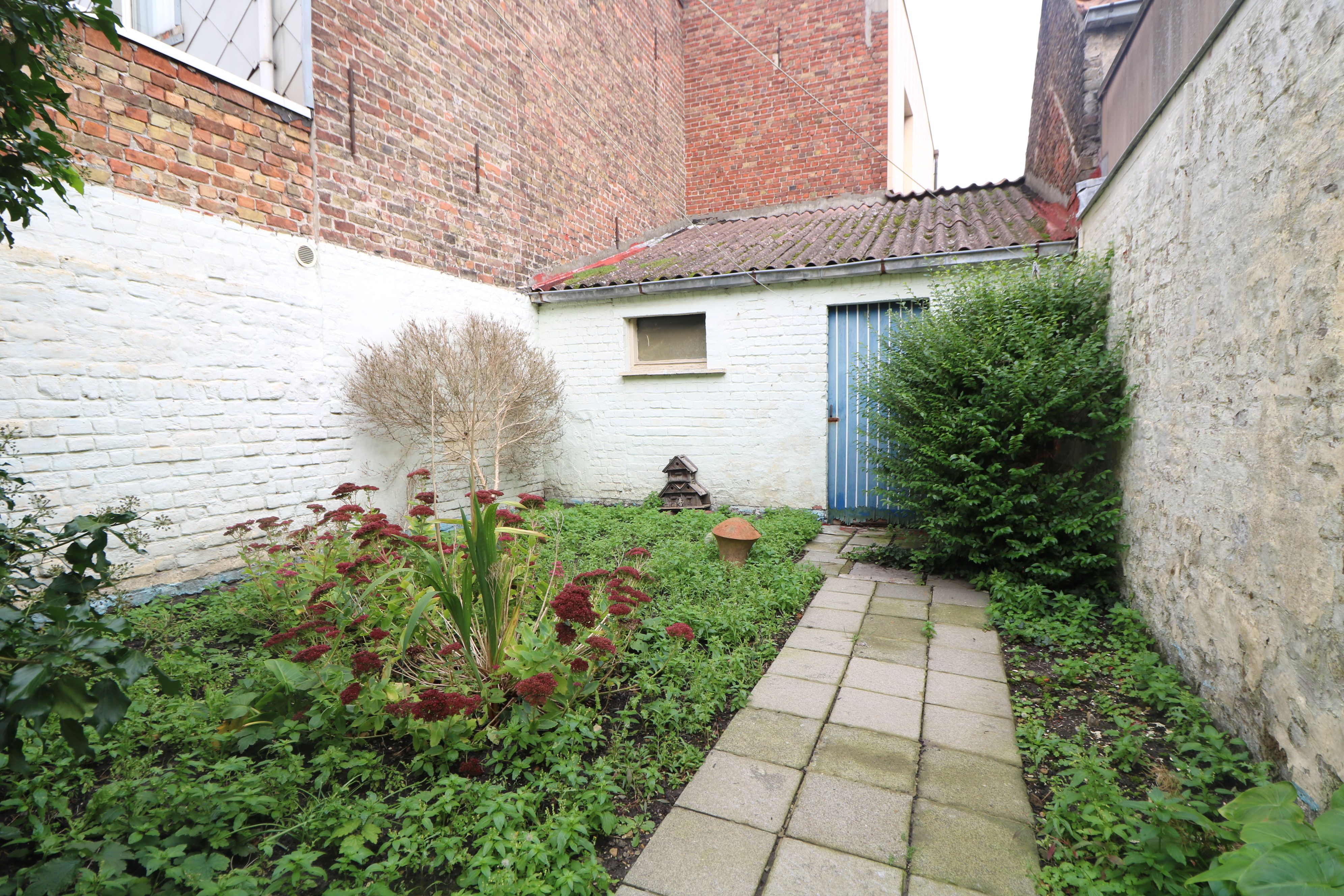 Goed verzorgde rijwoning met 3 slaapkamers en tuin, op wandelafstand van het centrum. foto 13