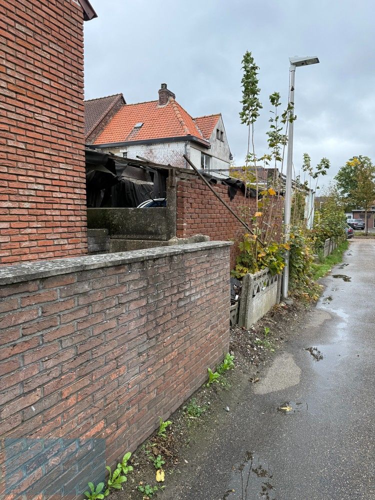 Te koop – Te renoveren halfopen woning met 3 slaapkamers en tuin in Zwartberg (Genk) foto 5