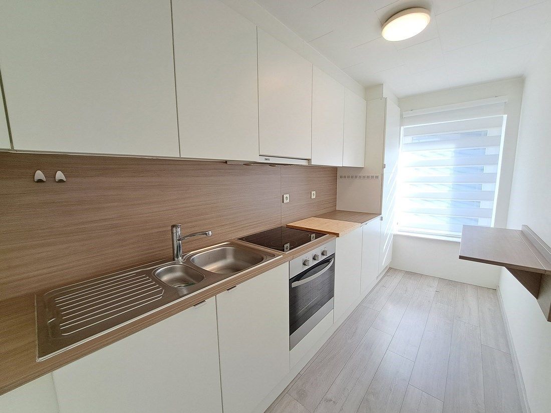 Knap gerenoveerd appartement te Genk centrum foto 8