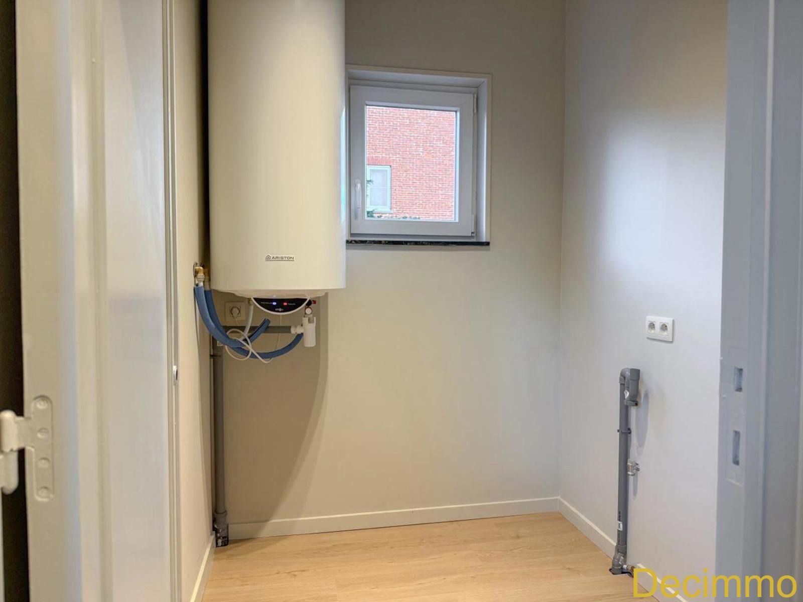 Volledig gerenoveerde woning met 3 slaapkamers, lage energiekost– rustig gelegen in het groen. foto 14