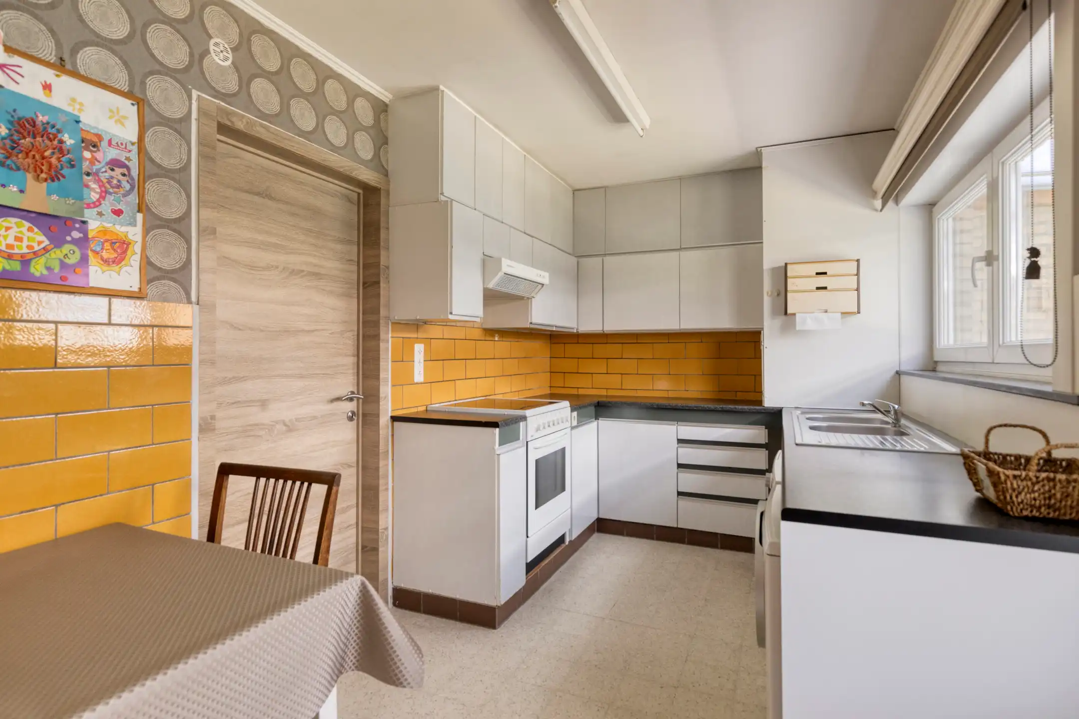 Ruime 3-gevelwoning met 4 slaapkamers en tuin te koop foto 7