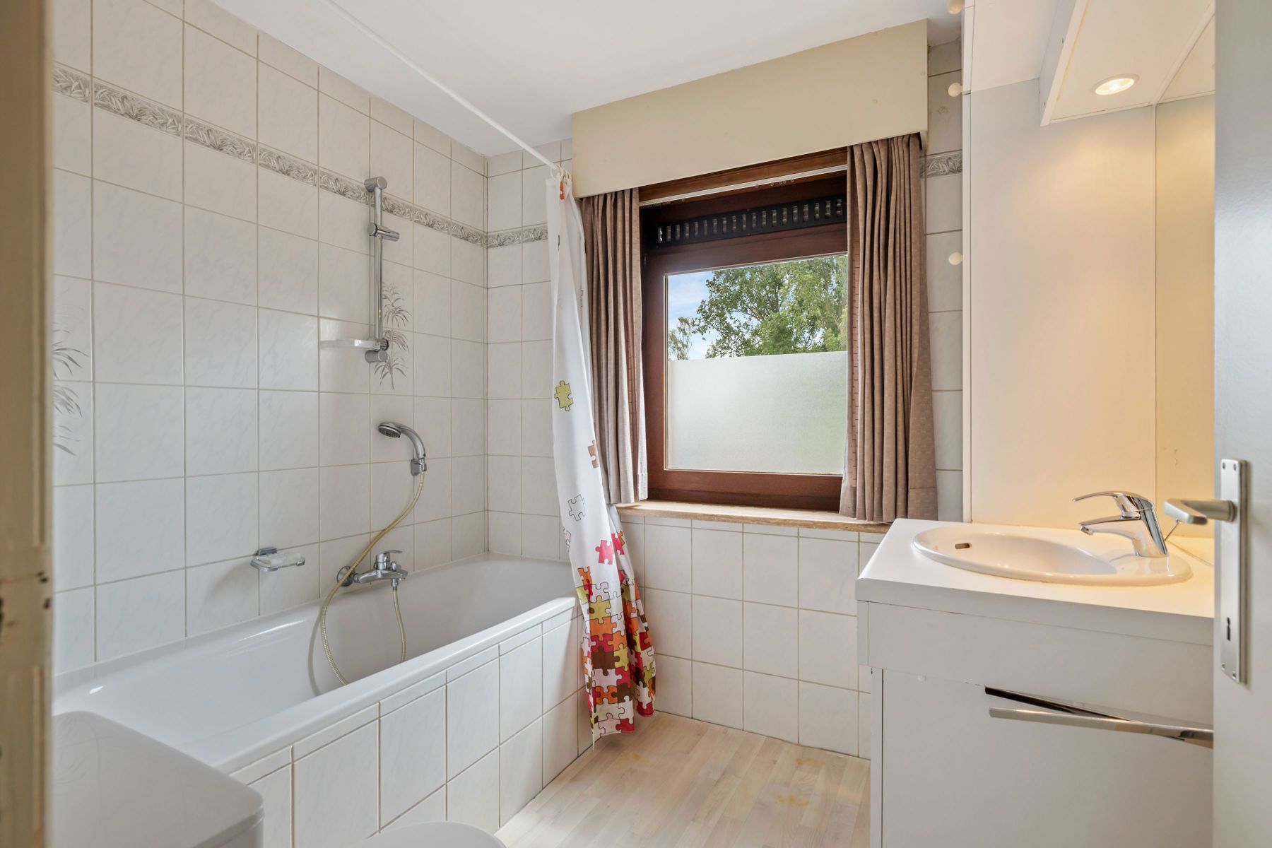 Halfopen woning met tuin, 3 slpks en dubbele garage foto 16