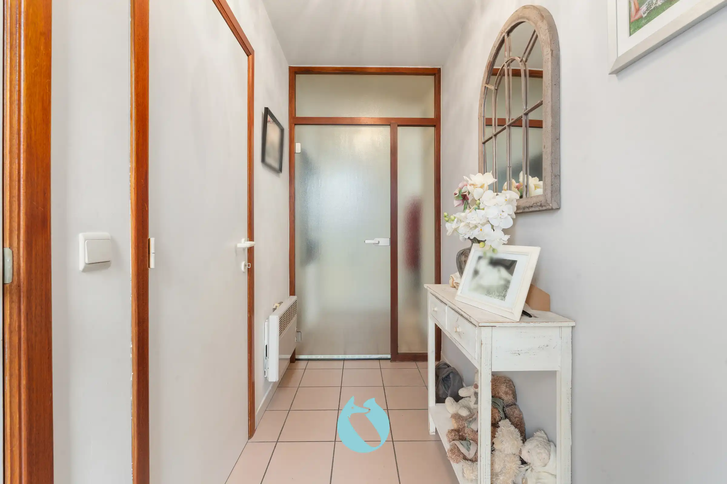 Gelijkvloers appartement met 2 slpks, tuin en garage foto 10