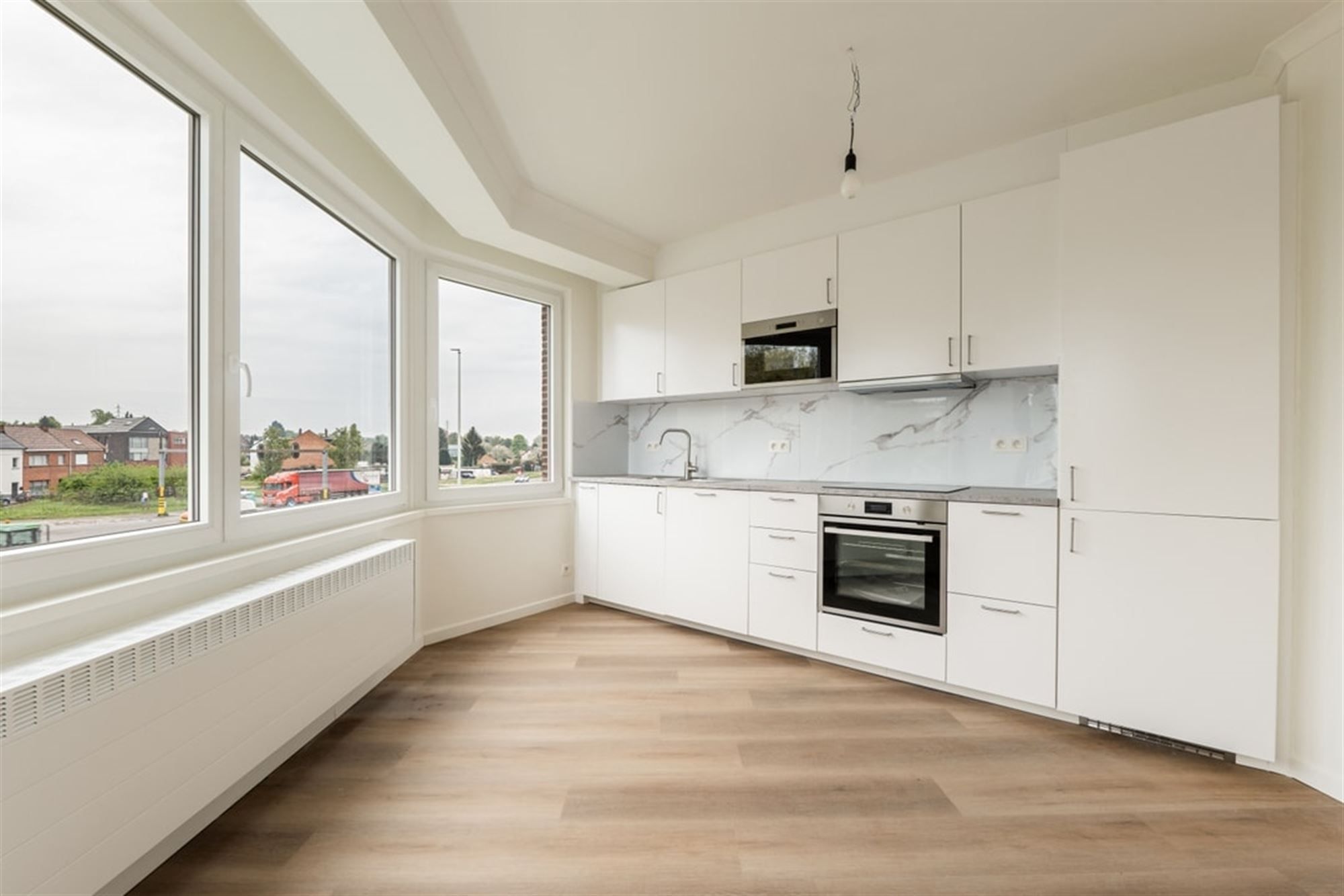 KNAP APPARTEMENT MET 2 SLKS EN PARKEERPLAATS VLAKBIJ HET CENTRUM VAN SINT-TRUIDEN  foto 11