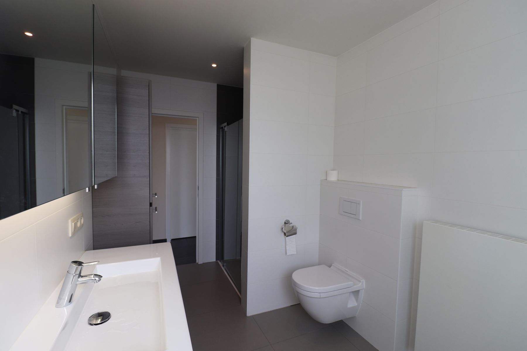 Een appartement met 2 slaapkamers, terras en autostaanplaats in het centrum van Merksplas. foto 9