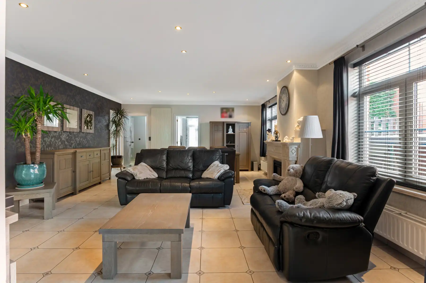 Ruime woning met 4 slpks, 2 bdks, garage en tuin foto 5