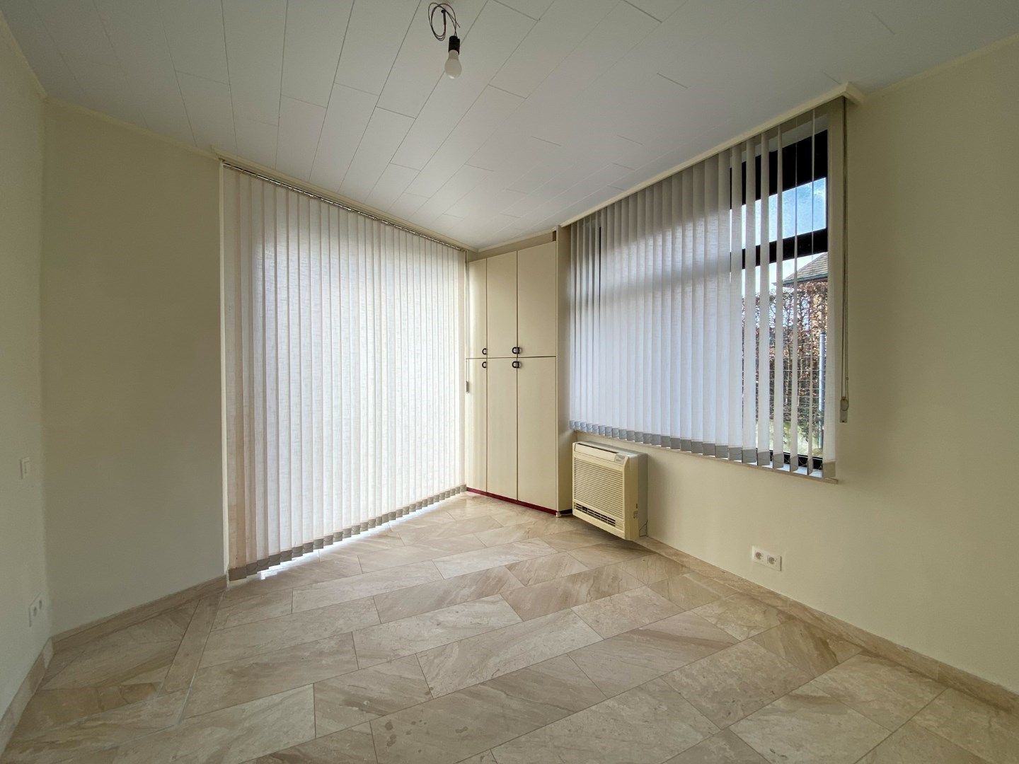 Ruim gelijkvloersappartement met 2 slaapkamers en garage. foto 12