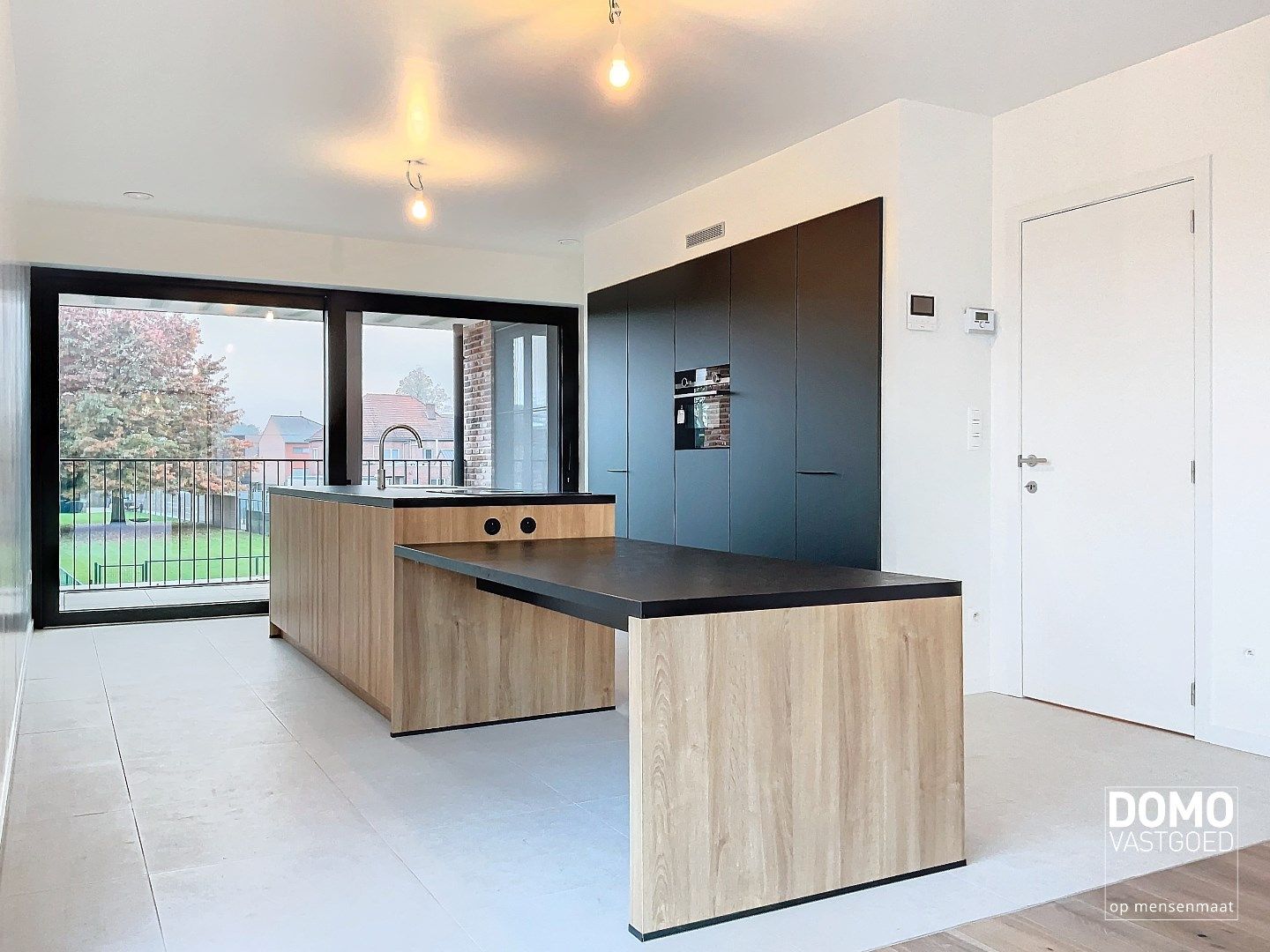 Nieuwbouwappartement met 2 slaapkamers en terras te Kermt foto 3