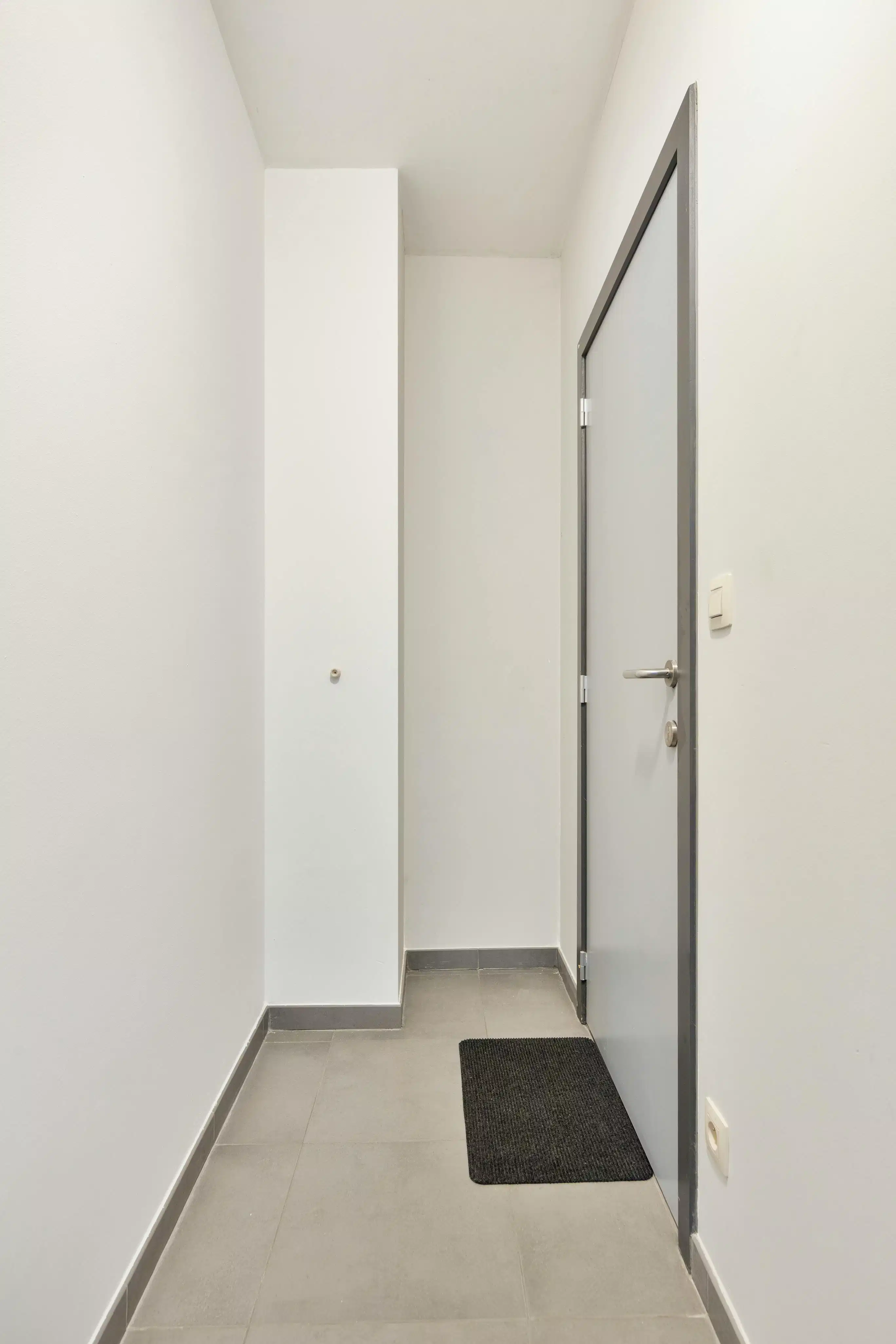 Instapklaar gelijkvloers app met terras en autostaanplaats! foto 14