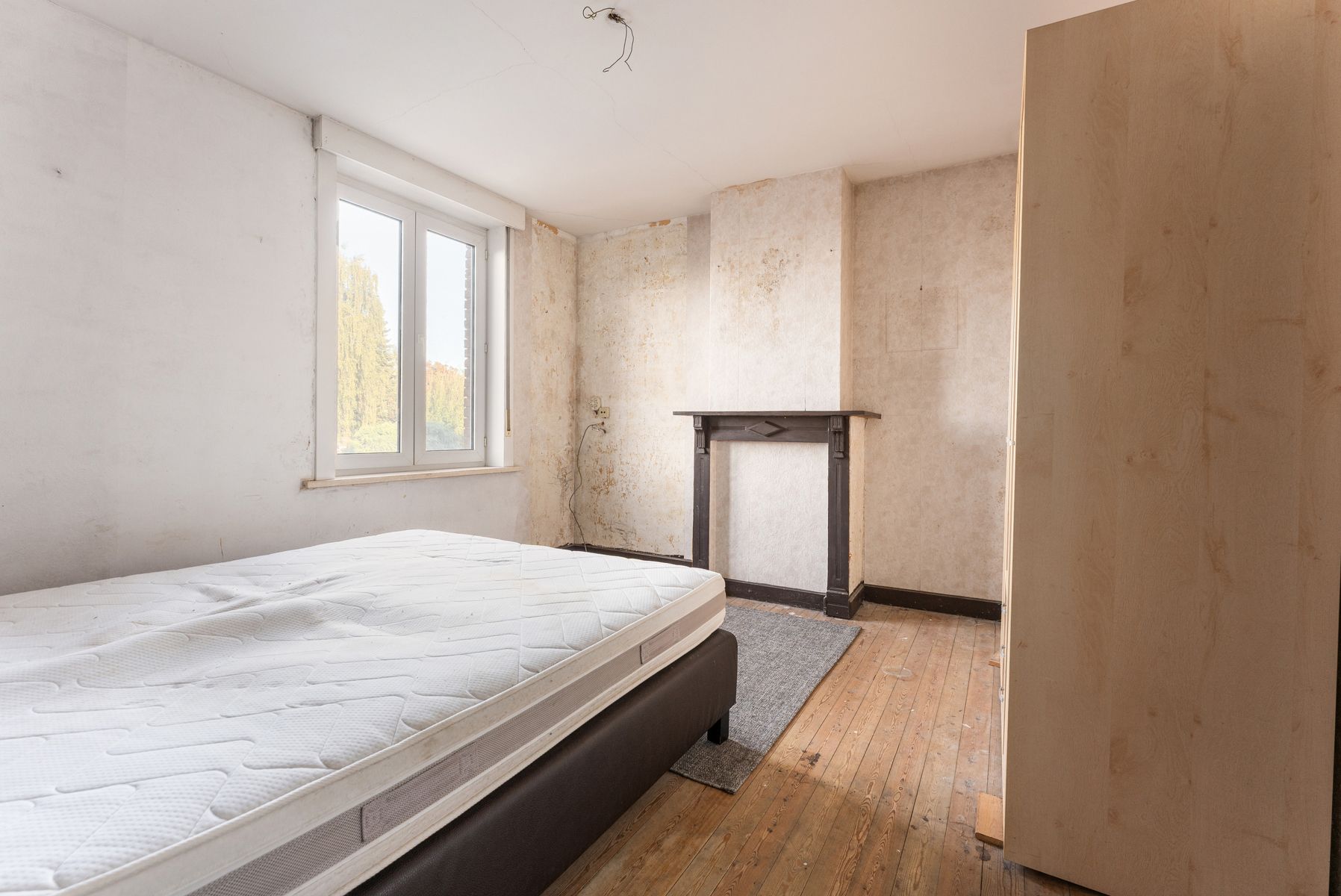 Ruime te renoveren woning met opslagplaats van 65 m² foto 10