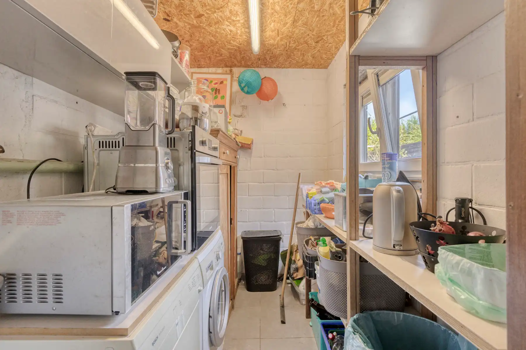 Instapklare woning met gezellige tuin en terras in het centrum van Opwijk! foto 16