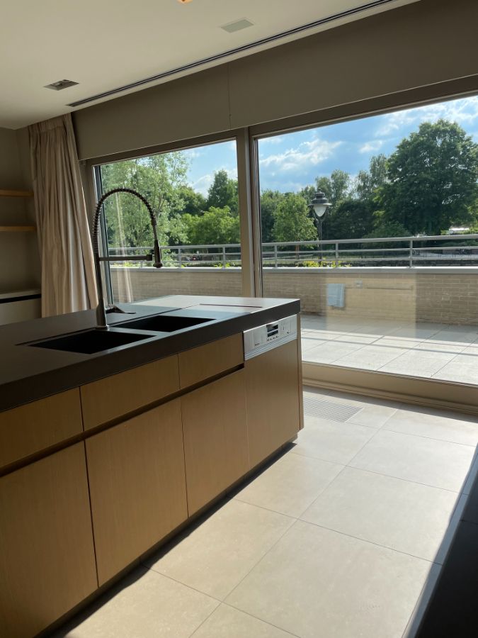 LUXE APPARTEMENT + zeer riant zongericht terras, dubbele garage & (wijn)kelder foto 29