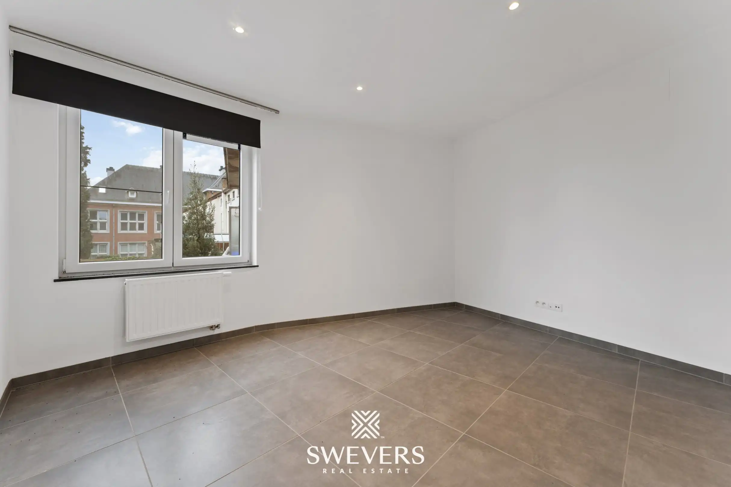 Instapklaar 2-slaapkamer appartement met autostaanplaats in hartje Tongeren   foto 8