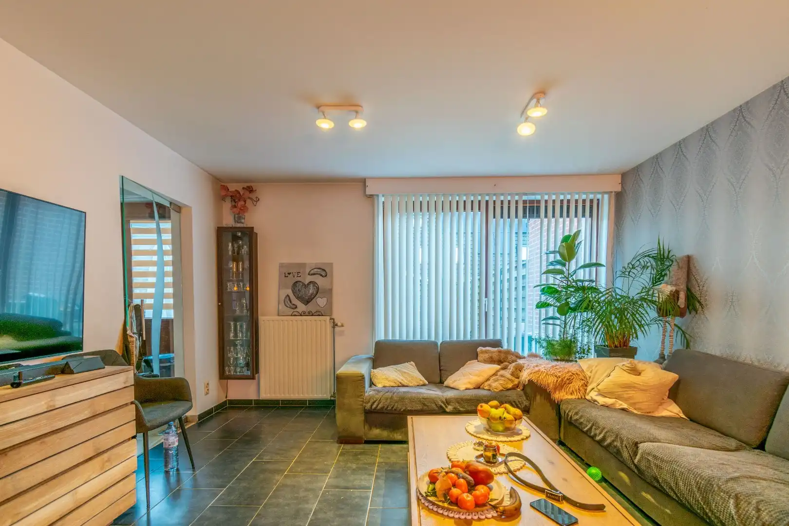 Een goed onderhouden woning met 3 slaapkamers + garage foto 2