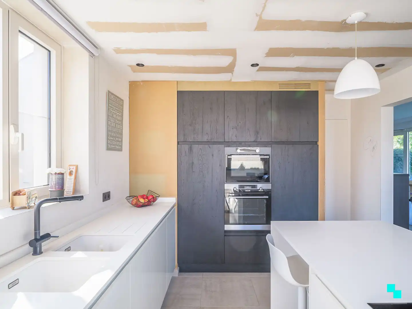 Instapklare woning met vijf kamers in het hart van Merelbeke foto 7
