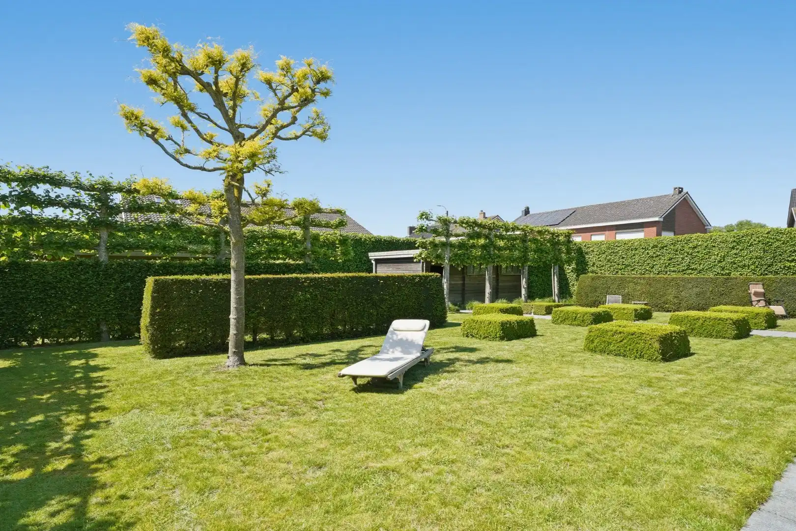Alleenstaande woning met zonnige tuin op 980 m² foto 15