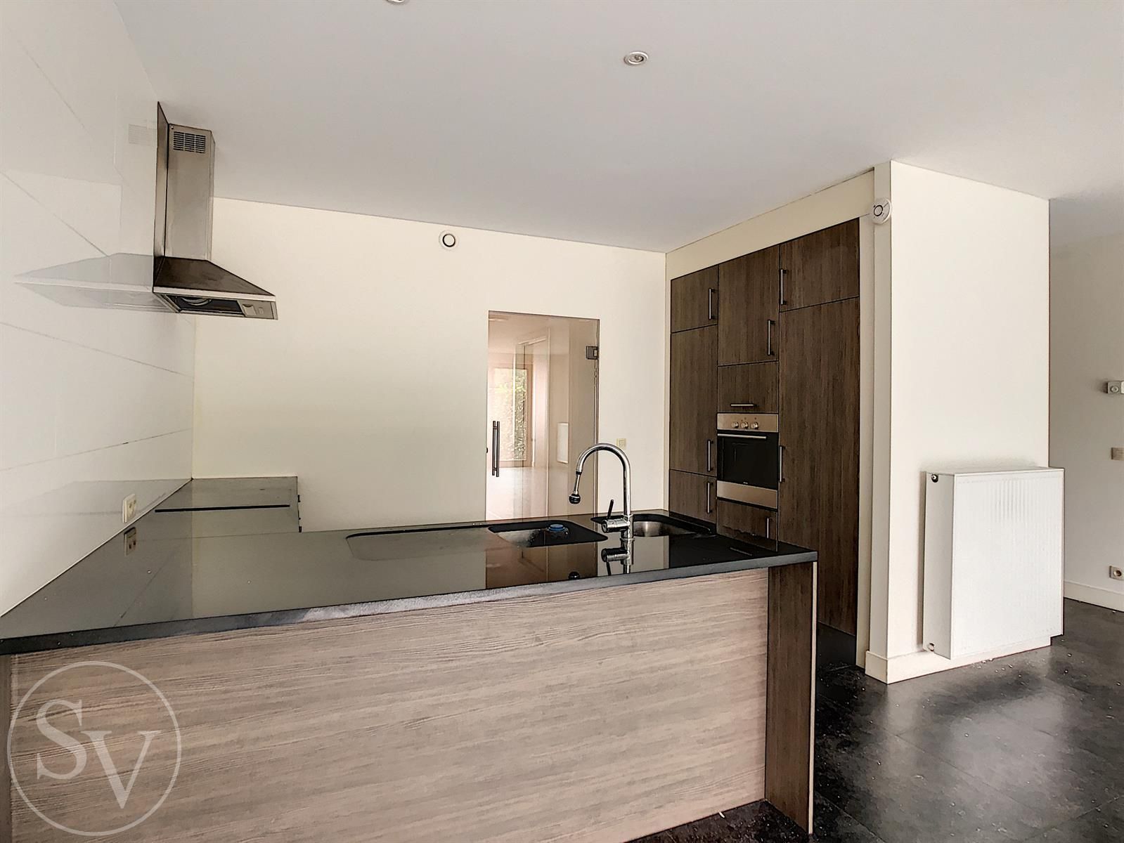 Gelijkvloers appartement, 2 slpk en tuin! foto 5