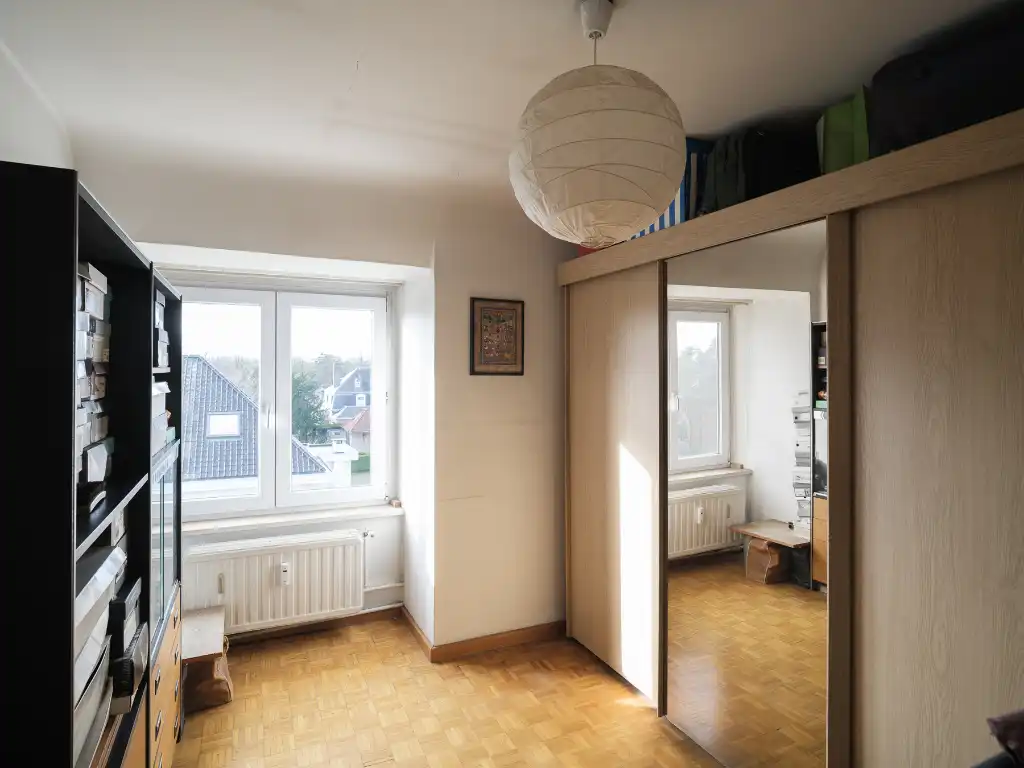 Ruim en stijlvol duplexappartement (bew. opp. ±154 m²) met 3 slaapkamers, gelegen in de standingvolle residentie ‘Versailles’, op slechts 10 minuten van het centrum van Gent. foto 14