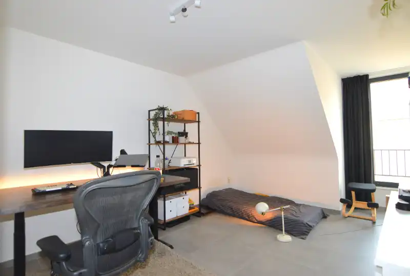 Appartement met 2 slaapkamers, terras en autostaanplaats te Boortmeerbeek. foto 3