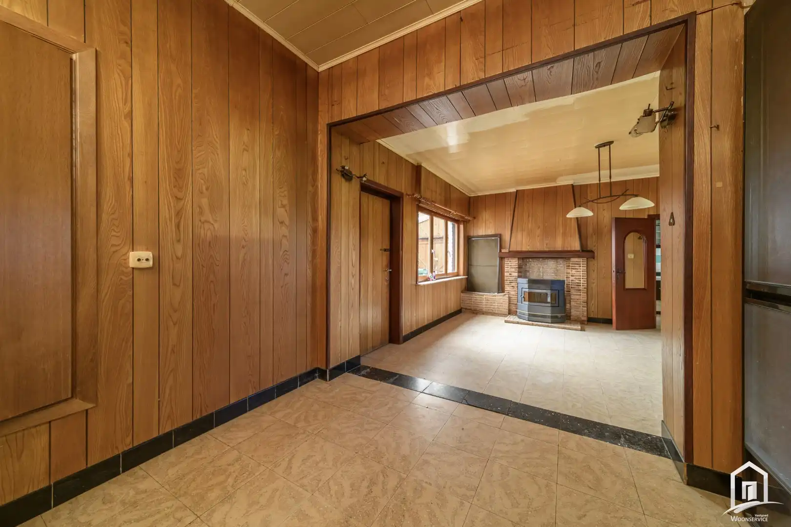 Te renoveren gezinswoning met 2 slaapkamers en ruime tuin foto 8