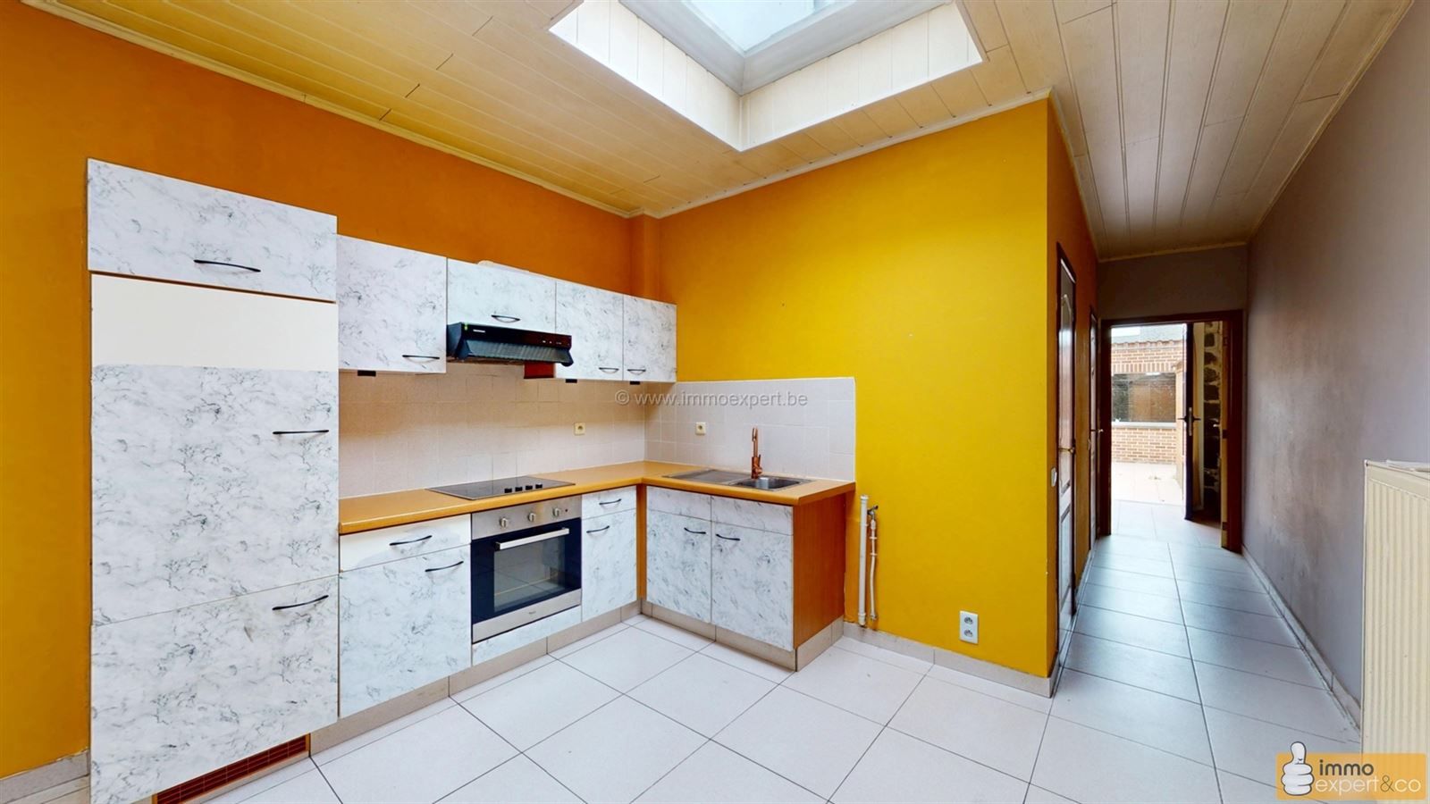 NINOVE: Centraal gelegen woning met 2 slpks, garage en koer foto 4