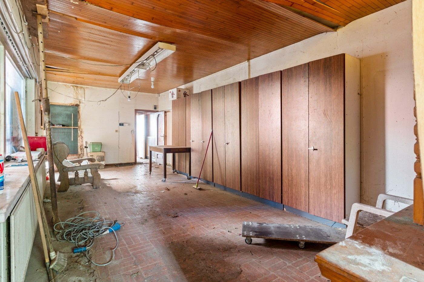 Te renoveren woning met 2 slpk., garage en grote tuin foto 5