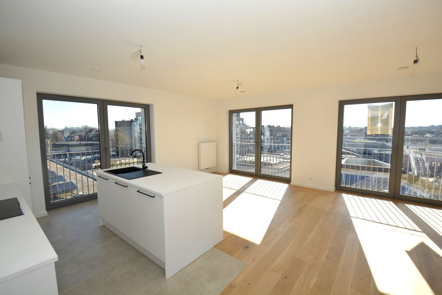 NIEUWBOUWAPP. MET 2 SLK, TERRAS EN PARKING! foto 4