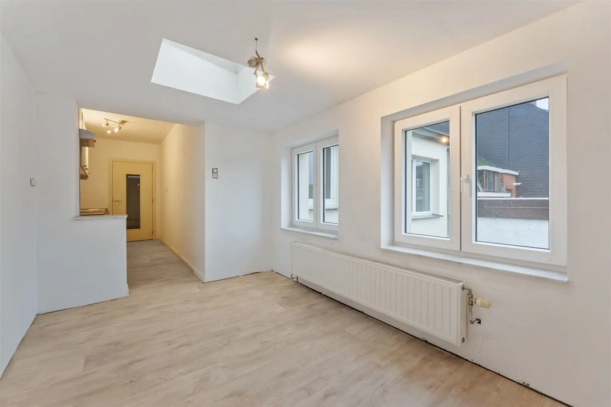 VERNIEUWD APPARTEMENT MET 2 SLAAPKAMERS PAL IN HET CENTRUM VAN BERINGEN foto 10