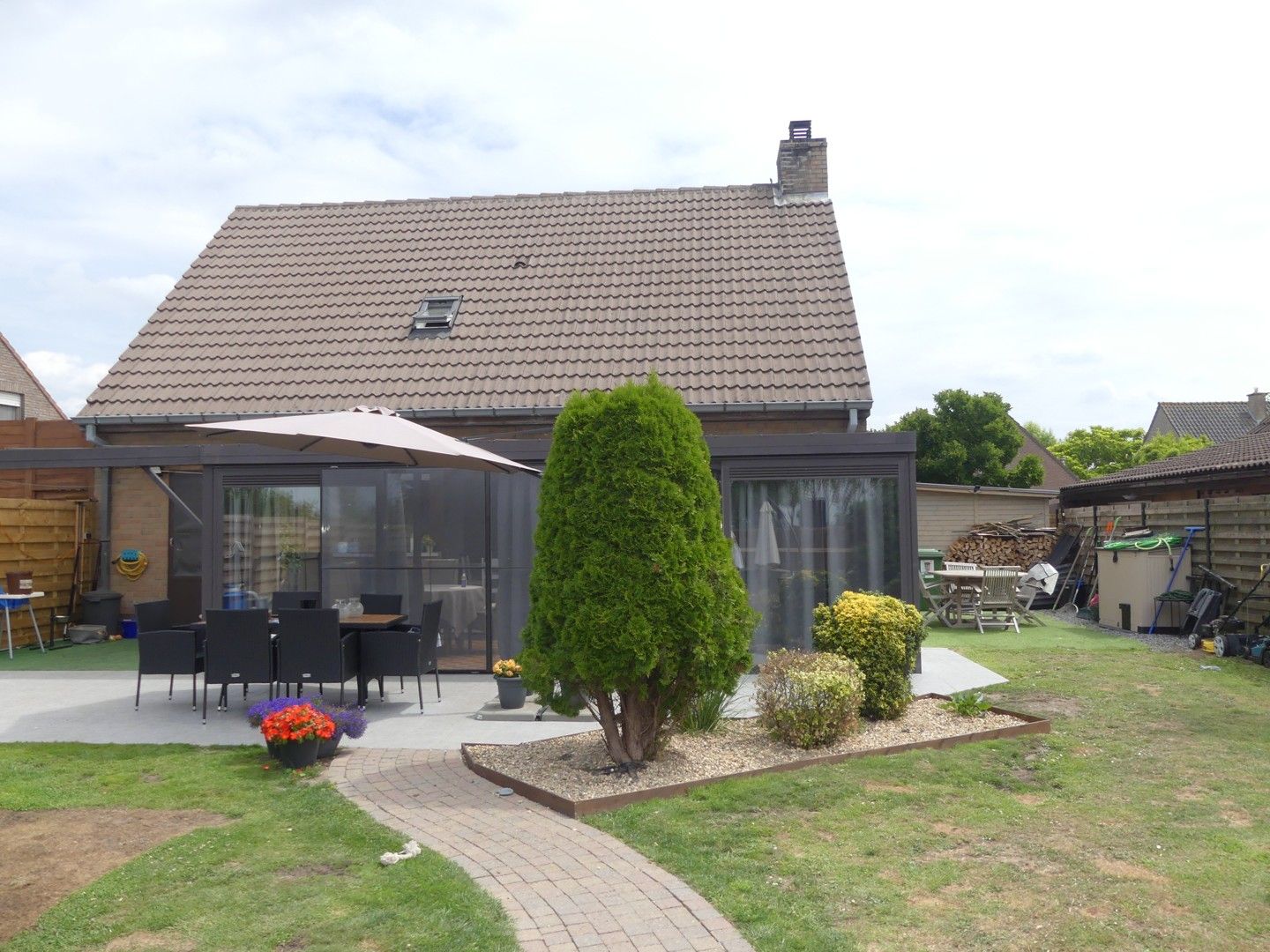 Alleenstaande woning met terras, zongerichte tuin en garage foto 17