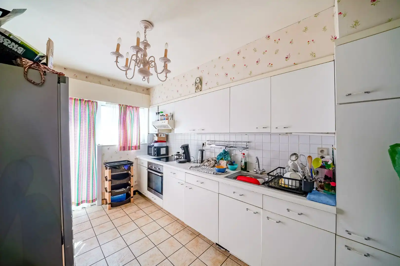 Opbrengstwoning met 2 verhuurde appartementen, tuin en 2 garages in Stene foto 5