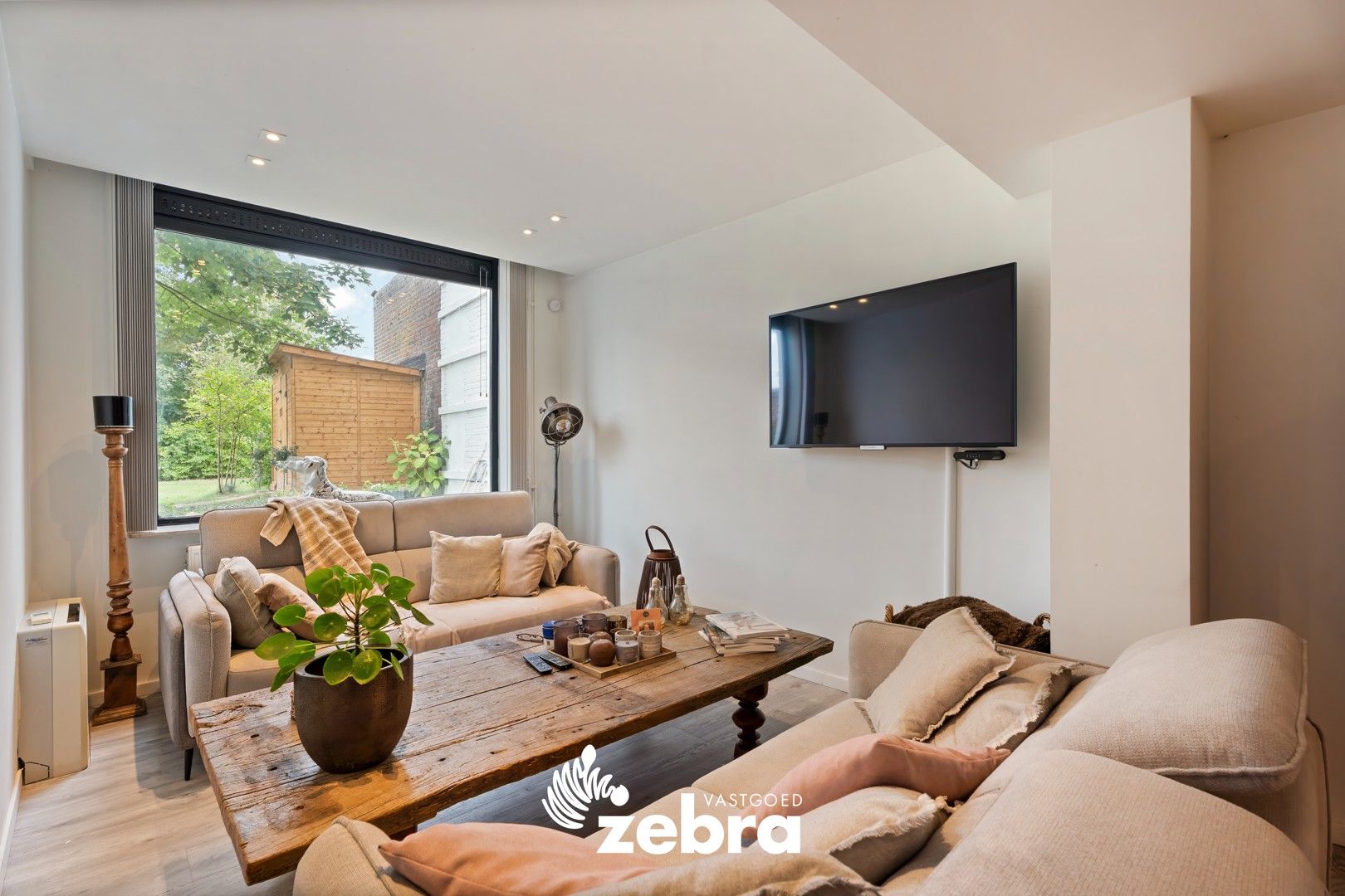 Gerenoveerde woning met 3 slaapkamers en prachtige tuin! foto 10