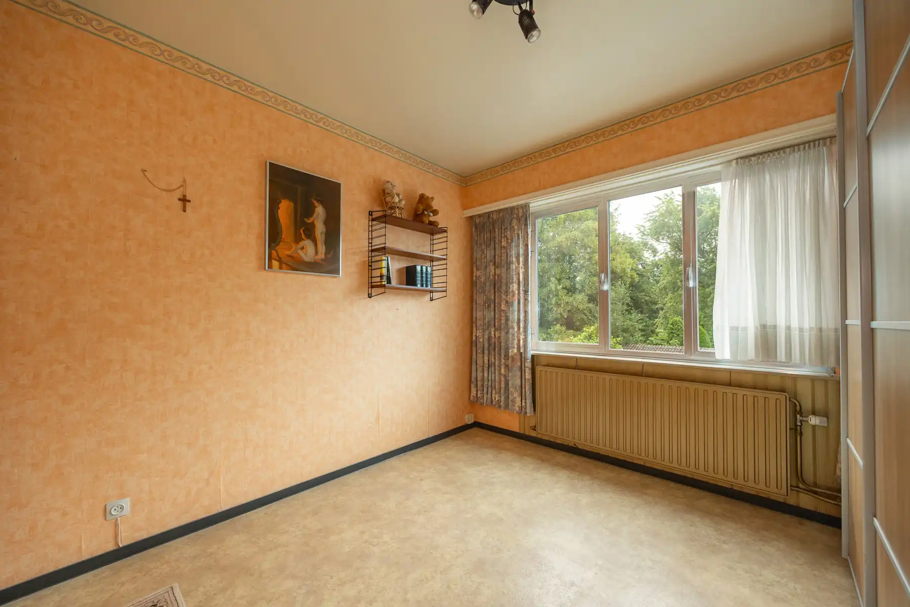 Ééngezinswoning met potentieel, garage en Zuidoost-tuin foto 11