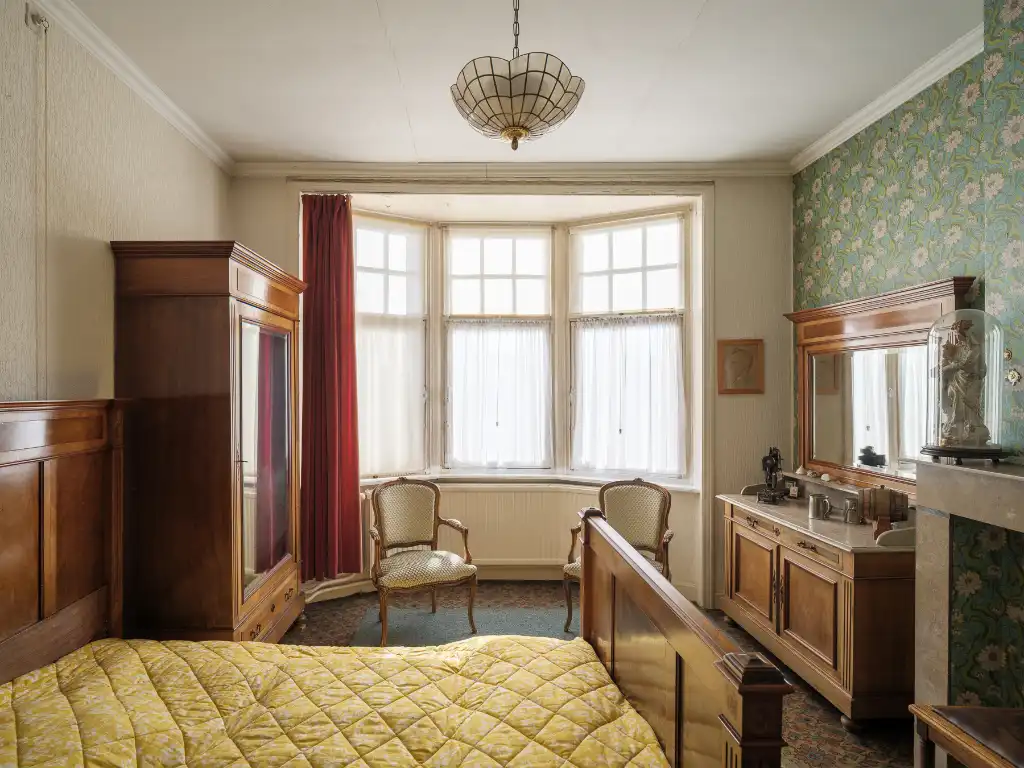 Architecturale herenwoning met drie bouwlagen en ruime tuin, opgetrokken in art deco en de Nieuwe Zakelijkheid. foto 7