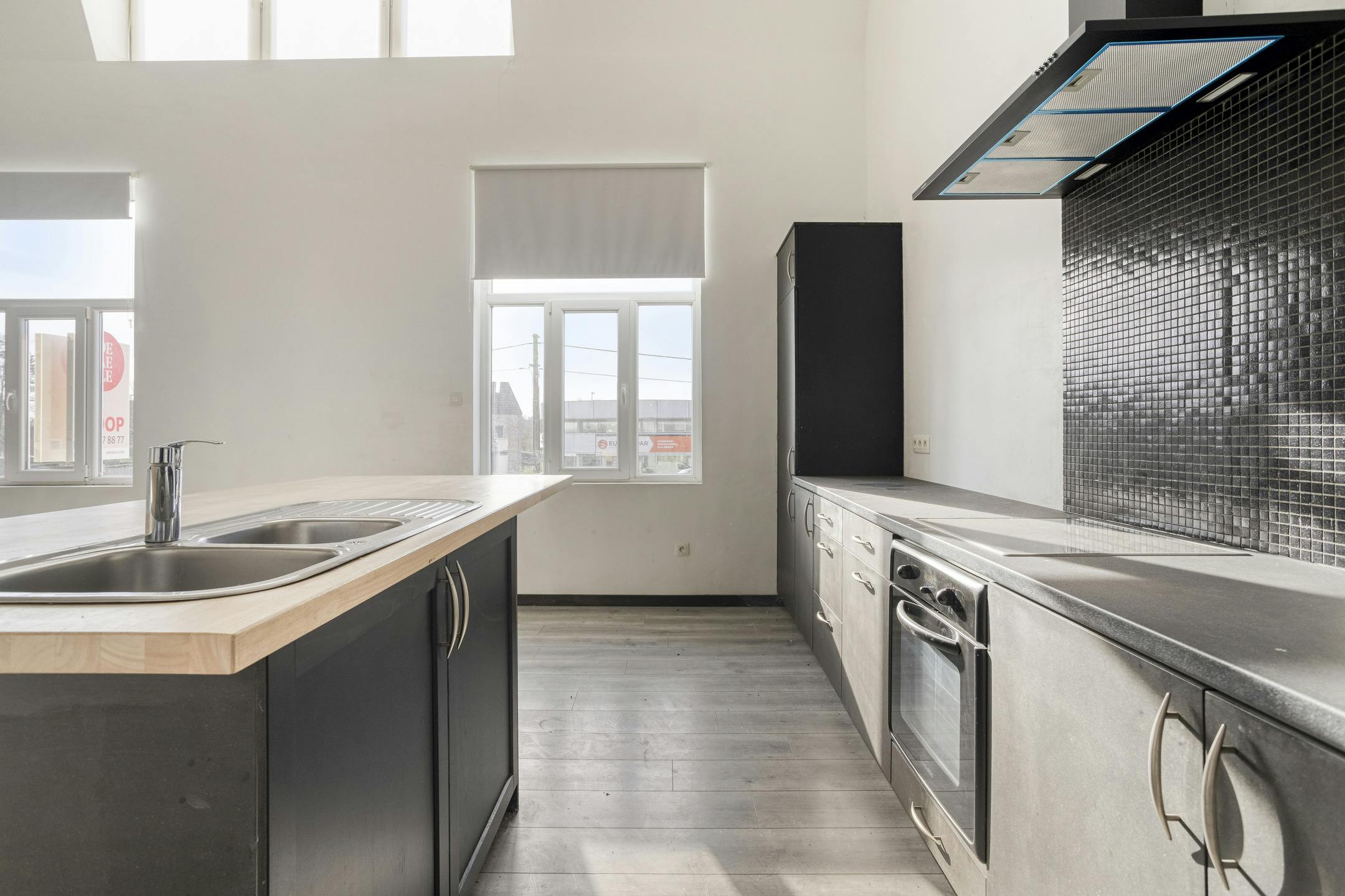 Handelspand met appartement en atelier te koop in Adegem foto 5