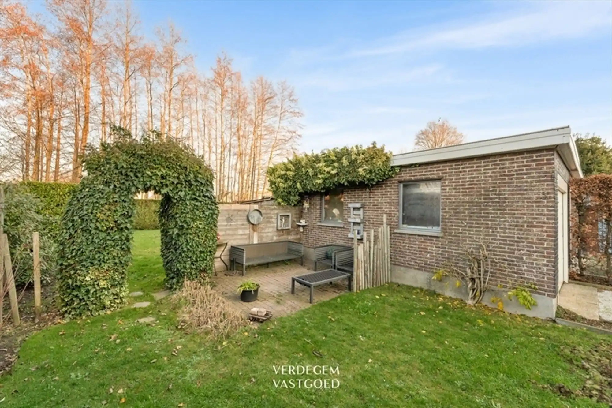 Stijlvolle en instapklare woning met 2+1 slaapkamers, garage en mooie tuin foto 20