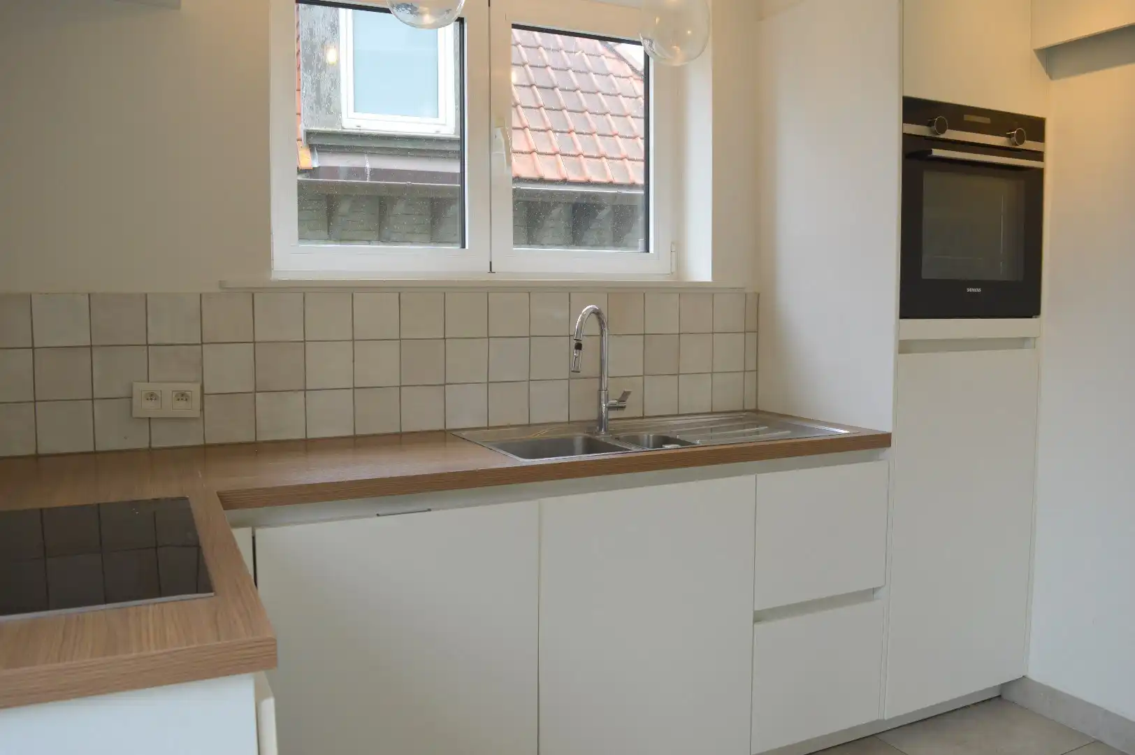 Ruime woning met garage, tuin en 3 slaapkamers in Kortrijk foto 7