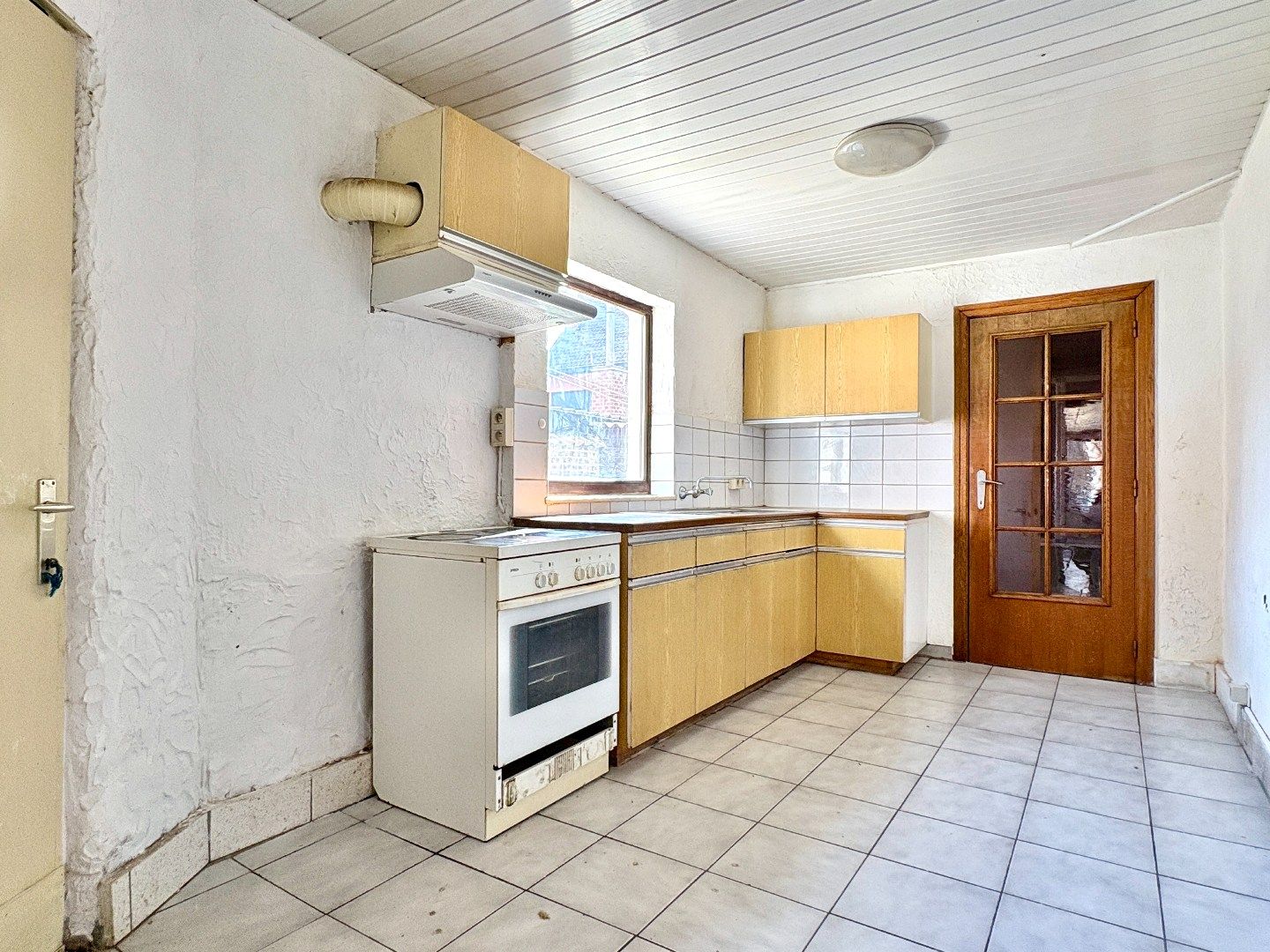 Centraal gelegen woning met goed georiënteerde tuin en 3 slaapkamers. foto 7